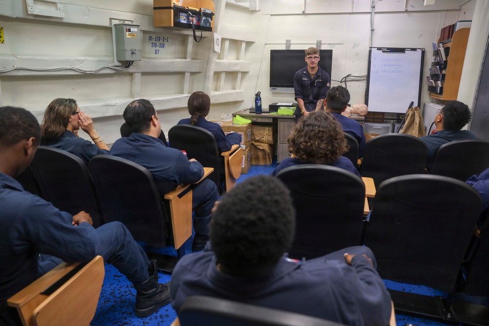 Sailors conduct CPR training aboard USS Oscar Austin