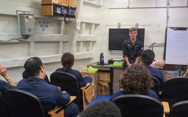 Sailors conduct CPR training aboard USS Oscar Austin