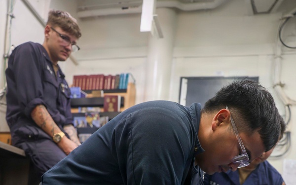 Sailors conduct CPR training aboard USS Oscar Austin