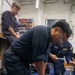 Sailors conduct CPR training aboard USS Oscar Austin