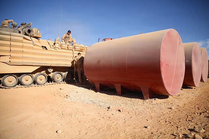 US Marines refuel vehicles in Jordan
