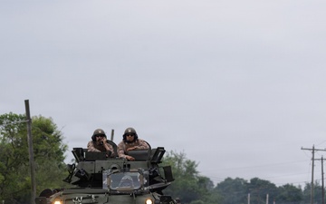 Marines with 4th Light Armored Reconnaissance Battalion Convoy Light Armored Vehicles