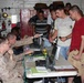 100628-M-4752B-Marines check-in from liberty on USS Nassau.jpg