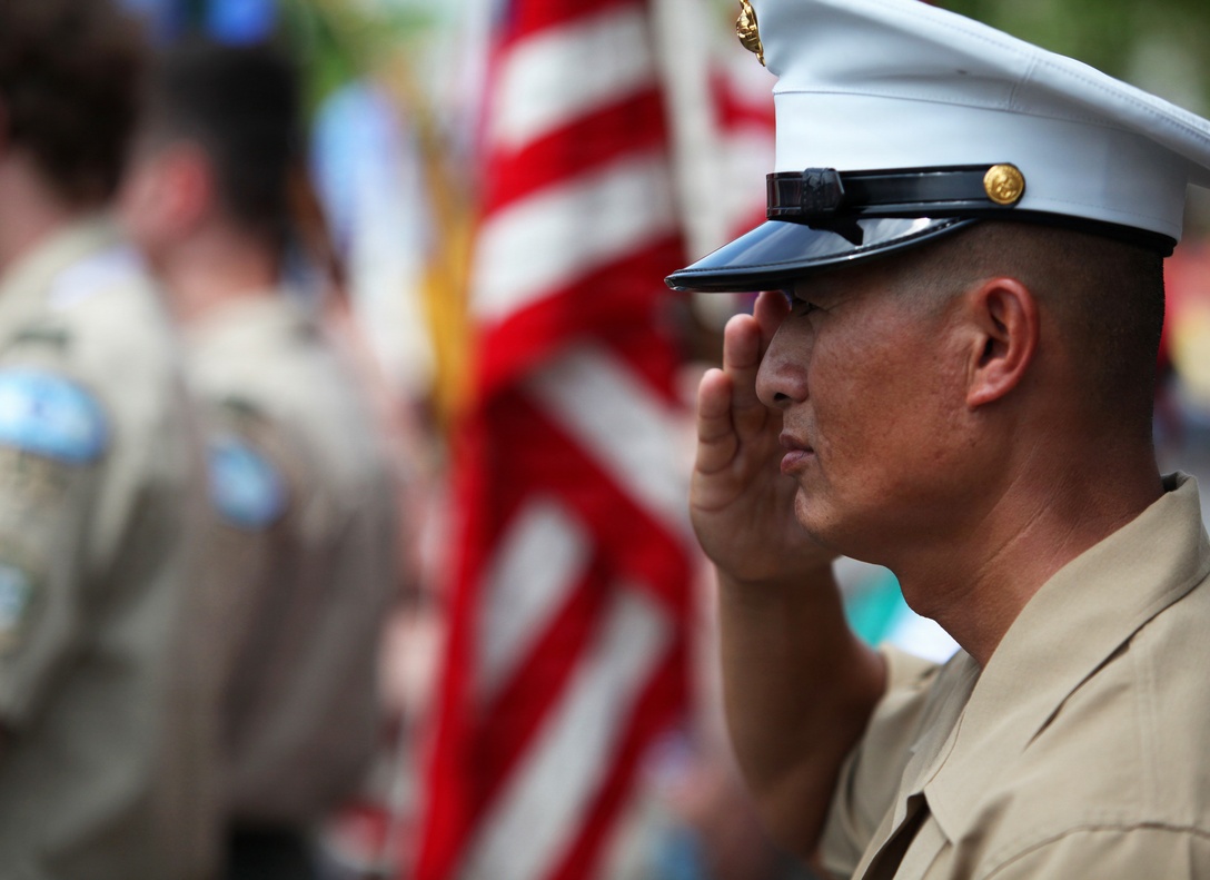 Marines with the 24th Marine Expeditionary Unit, participate in a Memorial Day parade at Glendale N.Y. May 30, 2011. Various units from II Marine Expeditionary Force and Marine Forces Reserve have organized under the 24th MEU to form the to form the Special Purpose Marine Air Ground Task Force - New York. The Marines embarked on the Navy's Amphibious Assault Ships, the USS Iwo Jima (LHD -7) and USS New York (LPD-21) to take part in Fleet Week New York 2011 from May 25 to June 1. The Marines will showcase the capabilities of the MAGTF, and also honor those who have served by participating in various events during the Memorial Day weekend.