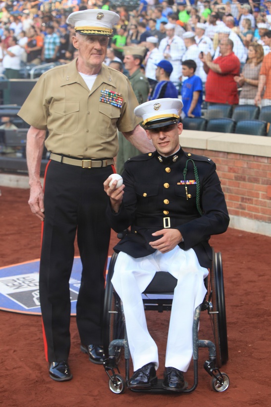 Major Gen. Richard Mills, I Marine Expeditionary Force Commanding General, and 1st Lt. Matthew A. Krempel, pose for a photo after the ceremonial first pitch at a New York Mets game, May 30, 2011. Various units from II Marine Expeditionary Force and Marines Forces Reserve have organized under the 24th Marine Expeditionary Unit to form the Special Purpose Marine Air Ground Task Force - New York. The Marines are embarking on the Navy’s Amphibious Assault Ships, the USS Iwo Jima (LHD -7) and USS New York (LPD-21) to take part in New York City's Fleet Week from May 25 to June 1, 2011. There, the Marines will showcase the capabilities of the MAGTF, and also honor those who have served by participating in a various of events during the Memorial Day weekend.