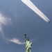 Thunderbirds fly over Statue of Liberty