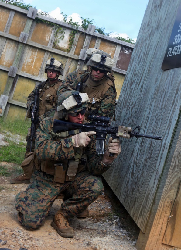 Marines with Bravo Company, 1st Battalion, 2nd Marine Regiment, conduct military operations in urban terrain training at the urban assault course on Fort Pickett, Va., Sept. 10, 2011. More than 900 Marines and sailors will take part in the deployment for training exercise at Fort Pickett, Sept. 6-23. The battalion is scheduled to attach to the 24th Marine Expeditionary Unit a few days after the training.
