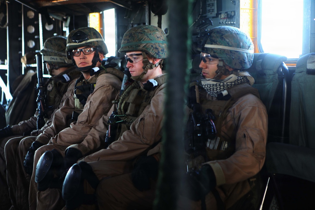 Marines with the Security Element, Headquarters and Service Company, Battalion Landing Team 1st Battalion, 2nd Marine Regiment, 24th Marine Expeditionary Unit are transported by a CH-53 Super Stallion Helicopter to the USNS Arctic to conduct a simulated Expanded, Visit, Board, Search and Seizure mission Dec. 5. The Marines conducted three simulated EVBSS mission as part of  the Composite Training Unit Exercise (COMPTUEX.) The EVBSS training is meant to prepare the Marines and Sailors to board vessels from sea and air. COMPTUEX, scheduled to take place Nov. 28 to Dec. 21, is the second of three at-sea exercises meant to build cohesion between the 24th MEU and Amphibious Squadron 8 (PHIBRON 8) in conducting amphibious operations, crisis response, and limited contingency operations while operating from the sea.