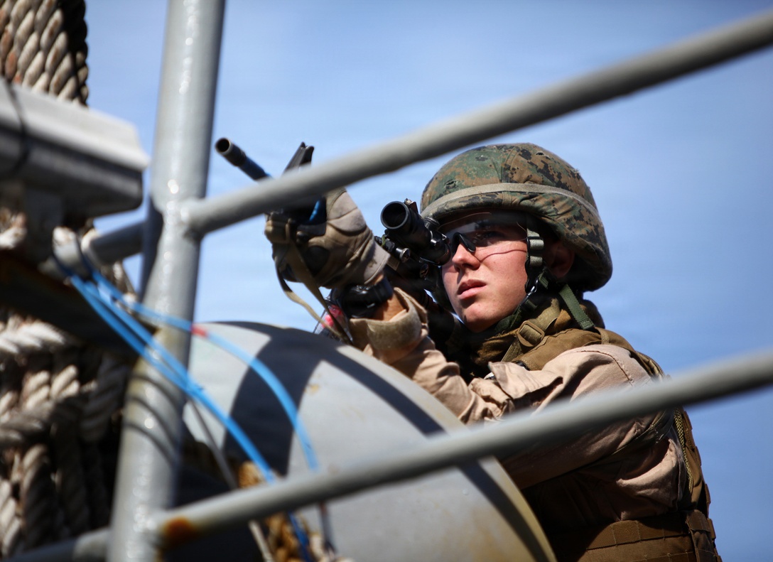 Marines with the 24th Marine Expeditionary Unit's Force Reconnaissance Platoon and Security Element, Headquarters and Service Company, Battalion Landing Team 1st Battalion, 2nd Marine Regiment provide during a simulated Expanded, Visit, Board, Search and Seizure, aboard the USNS Arctic, Dec. 7, 2011 The 24th MEU is currently taking part in Composite Training Unit Exercise (COMPTUEX), scheduled to take place Nov. 28 to Dec. 21. The training is meant to develop cohesion between the 24th MEU and Amphibious Squadron 8 (PHIBRON-8) in conducting amphibious operations, crisis response, and limited contingency operations while operating from the sea. (Official USMC Photo by: Lance Cpl. Michael Petersheim/ Released)