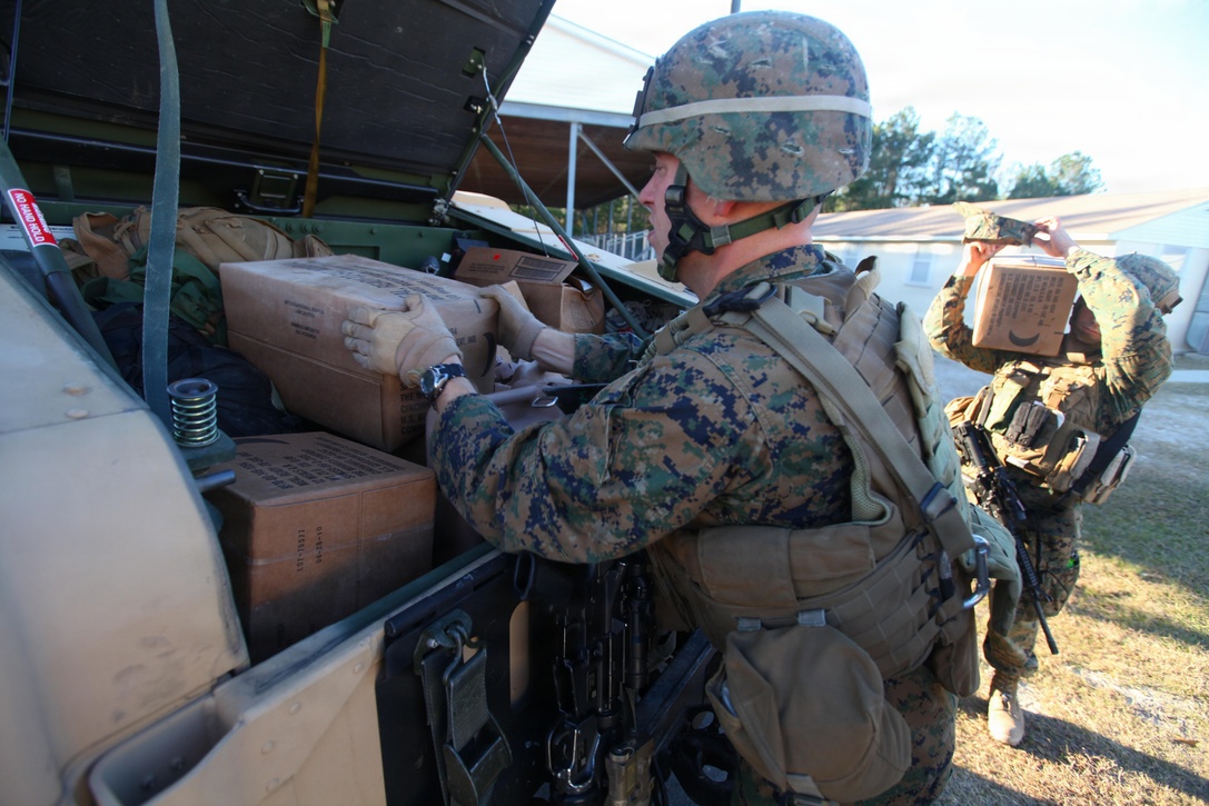 Marines with the 24th Marine Expeditionary Unit carry in supplies to a notional American Embassy during a training scenario as part of the Composite Training Unit Exercise (COMPTUEX), Dec. 15. The scenario has the Marines preparing for a non-combatant evacuation operation, called NEO for short, to evacuate American citizens and other authorized personnel from a country in turmoil. The 24th MEU is currently taking part in COMPTUEX, scheduled to take place Nov. 28 to Dec. 21. The training is meant to develop cohesion between the 24th MEU and Amphibious Squadron 8 in conducting amphibious operations, crisis response and limited contingency operations while operating from the sea.