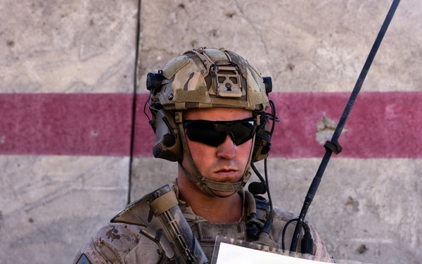 U.S. Marines with Golf Co., 2nd Bn., 1st Marines hold urban platoon assaults