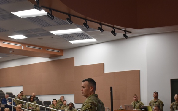 Col. Joe Z. Wells briefing audience during R2PC
