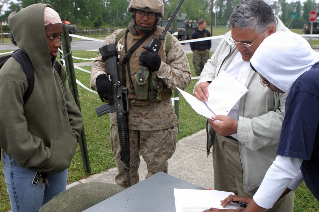 Marines from the 24th Marine Expeditionary Unit's (MEU) Service Support Group (MSSG) conduct an Evacuation Control Center (ECC) mission during the Certification Exercise (CertEx) the 24th MEU was undergoing. (US Marine Corps photo by Lance Corporal Andrew J. Carlson)