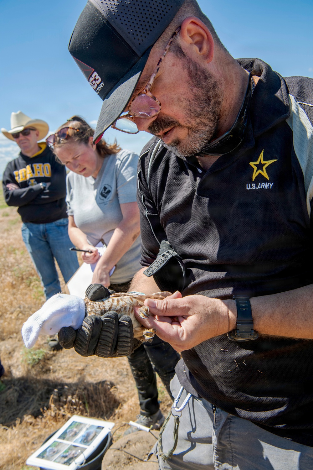 Oregon National Guard Soldiers and civilian employees learn about Eastern Oregon’s Borrowing Owls