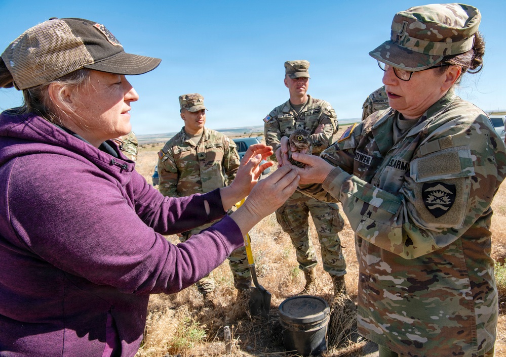 Oregon National Guard Soldiers and civilian employees learn about Eastern Oregon’s Borrowing Owls
