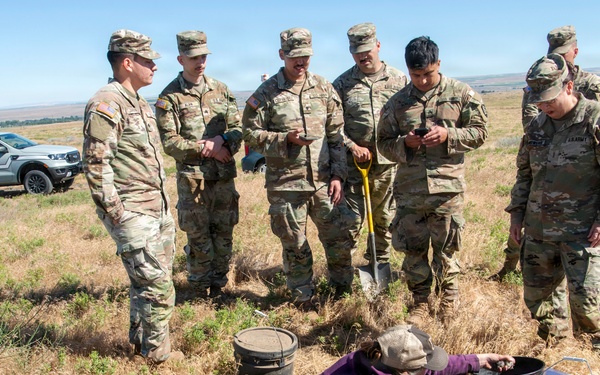 Oregon National Guard Soldiers and civilian employees learn about Eastern Oregon’s Borrowing Owls