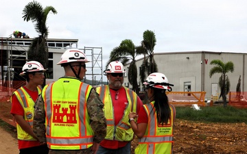 Leadership Tours New Classrooms Following Typhoon Sinlaku