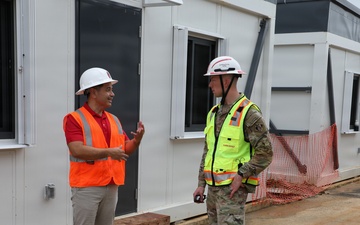 Leadership Tours New Classrooms Following Typhoon Sinlaku