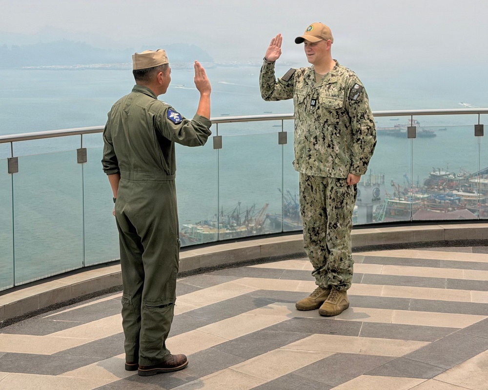 Lt. Cmdr. Joel Thiesfeldt, bandmaster of Pacific Fleet Band, is promoted to current rank.