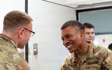 MDC-E Commander Reenlists Sgt. Darius Walker