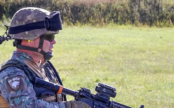 Soldiers with the NATO FLF Battle Group-Poland conduct joint weapons familiarization training in Poland
