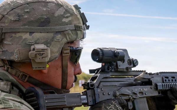 Soldiers with the NATO FLF Battle Group-Poland conduct joint weapons familiarization training in Poland