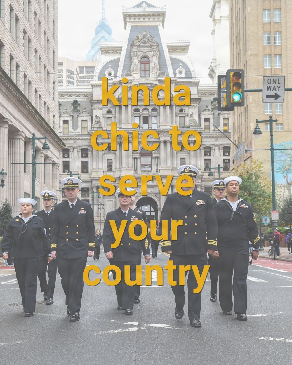 A group of U.S. Navy personnel in dress uniforms march down a city street in front of a large ornate government building, identifiable as Philadelphia City Hall. Overlaid text reads 'kinda chic to serve your country' in bold yellow typography. The image appears to be a social media graphic or recruitment-style post.