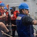 USS Mustin conducts replenishment-at-sea with USNS Wally Schirra