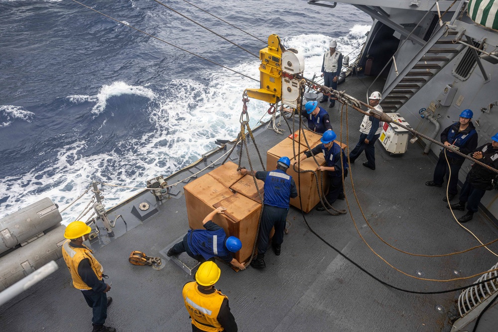 USS Mustin conducts replenishment-at-sea with USNS Wally Schirra