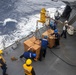 USS Mustin conducts replenishment-at-sea with USNS Wally Schirra