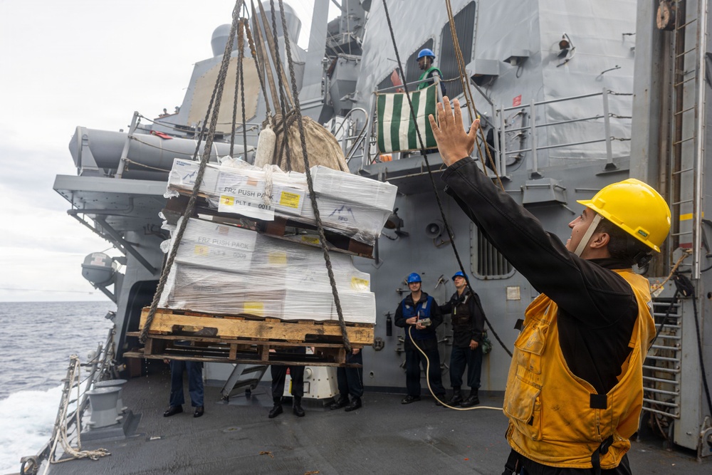 USS Mustin conducts replenishment-at-sea with USNS Wally Schirra