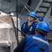 USS Mustin conducts replenishment-at-sea with USNS Wally Schirra