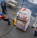 USS Mustin conducts replenishment-at-sea with USNS Wally Schirra