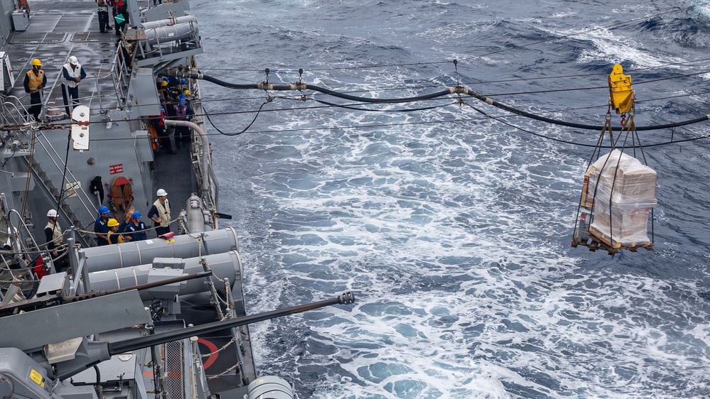 USS Mustin conducts replenishment-at-sea with USNS Wally Schirra