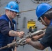 USS Mustin conducts replenishment-at-sea with USNS Wally Schirra