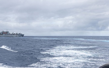 USS Mustin conducts replenishment-at-sea with USNS Wally Schirra