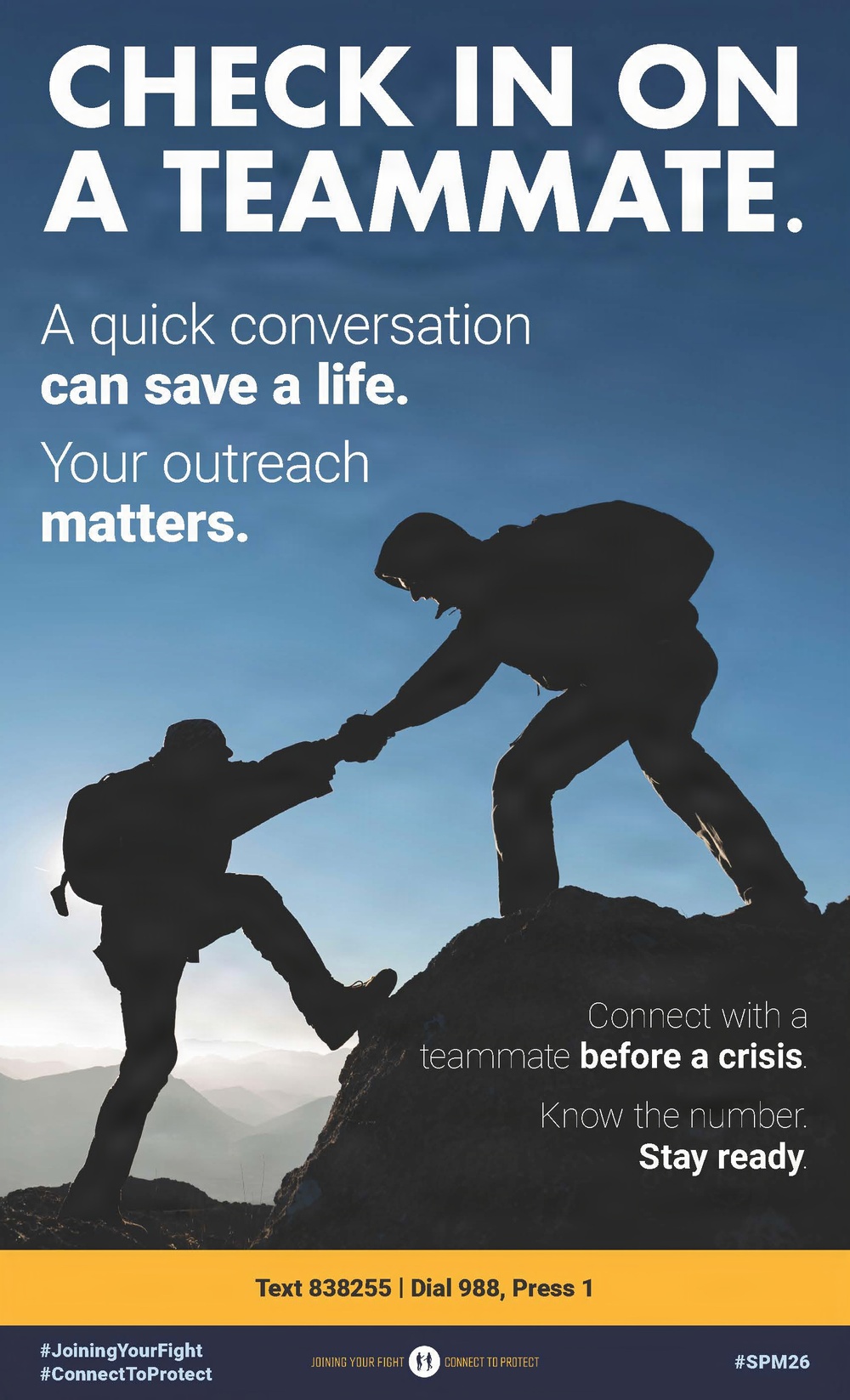 A mental health awareness poster targeting teammates or colleagues, encouraging proactive check-ins to prevent crisis situations. The poster features a silhouetted image of one person helping another climb a rocky summit, symbolizing support and outreach. It provides crisis contact information including a text number and phone line.