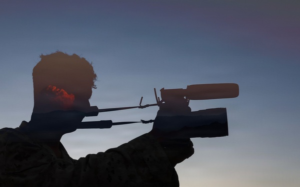 A silhouetted individual wearing camouflage clothing is aiming a scoped rifle at dusk or dawn. The scene is set in an open, arid landscape with mountains visible in the background. A white pickup truck is parked in the background to the right.