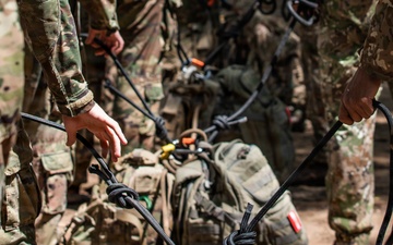Multinational Soldiers participate in Jungle Swim Training, SV26