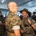 Lima Company Senior Drill Instructor Inspection A U.S. Marine drill instructor wearing a campaign cover (drill sergeant hat) is confronting a recruit in what appears to be a barracks setting. The drill instructor is grabbing the recruit's collar and appears to be yelling, a classic training scenario during Marine Corps boot camp. Multiple other recruits and personnel are visible in the background.