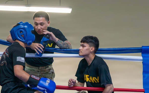 1st Cavalry Division Troopers box head-to-head during Cav Week 105
