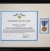 A framed Department of the Army certificate presenting the Civilian Award for Humanitarian Service to Richard D. Rappe, dated 21 April 2006. The award recognizes his support to relief efforts following the September 11, 2001 terrorist attack on the World Trade Center, specifically his role in FEMA relief operations in New York City. The framed display includes both the certificate and the physical medal mounted alongside it.