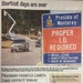 A newspaper article titled 'Shortcut days are over' covers new vehicle access restrictions at the Presidio of Monterey military installation. The article, written by Sylvia Moore for the Monterey Herald, announces that the Army is implementing controlled vehicle access to prevent terrorist threats. A photograph shows a 'Proper I.D. Required' sign at the Lighthouse Avenue and Private Bolio Road entrance, listing driver license, vehicle registration, and proof of insurance as required documents.