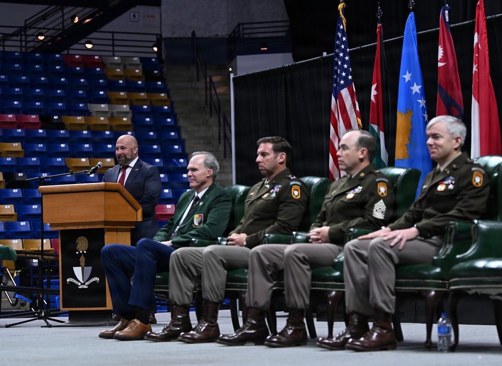 Soldiers Don Green Beret at Special Forces Graduation
