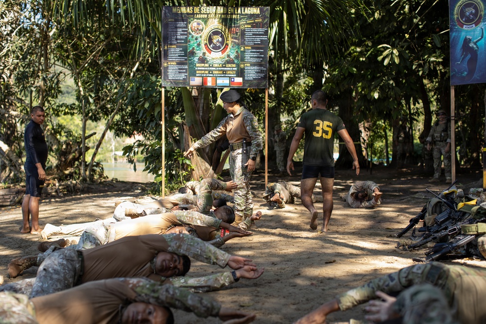 Multinational Forces Conduct Jungle Swimming at SV26
