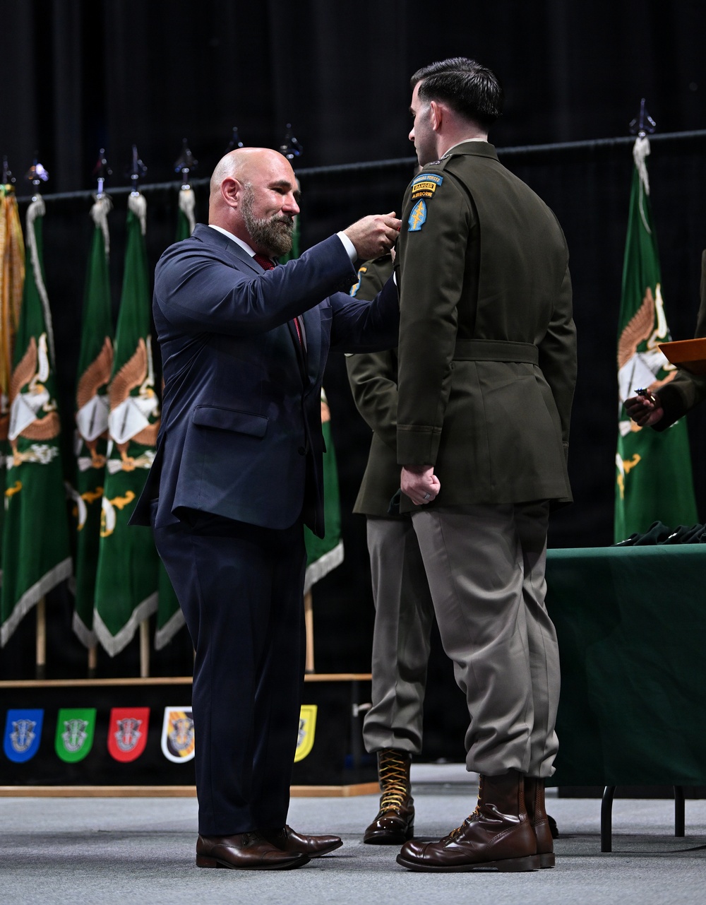 Soldiers Don Green Beret at Special Forces Graduation
