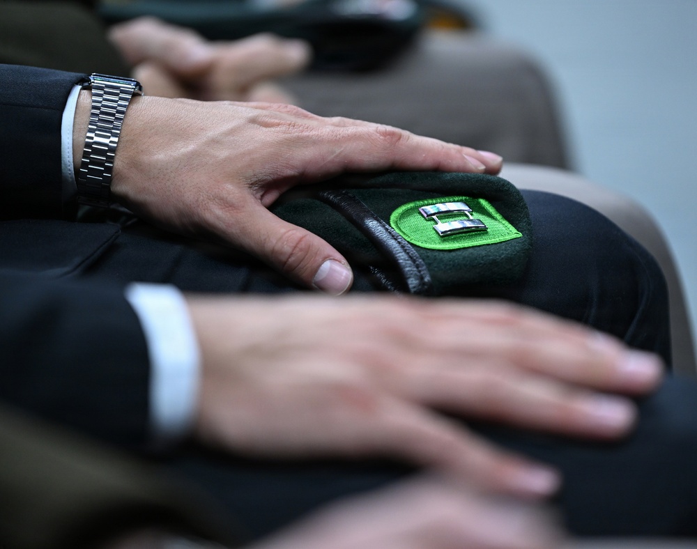 Soldiers Don Green Beret at Special Forces Graduation