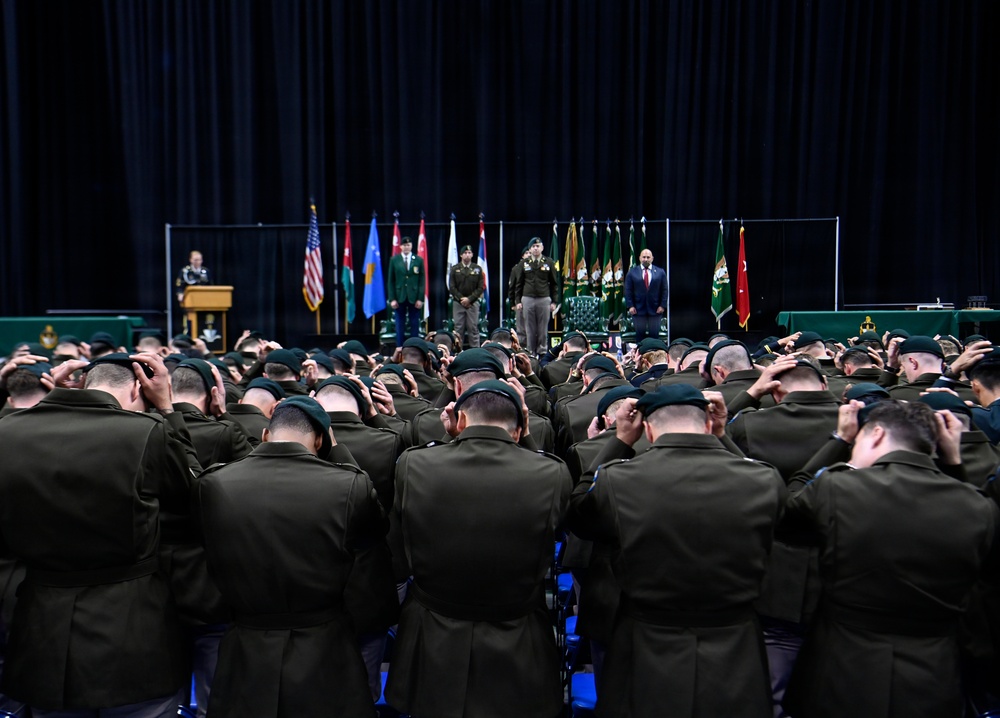 Soldiers Don Green Beret at Special Forces Graduation