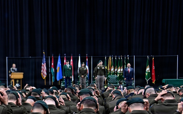Soldiers Don Green Beret at Special Forces Graduation