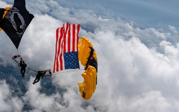 Golden Knights Soar Over Owensboro With American, POW/MIA Flags